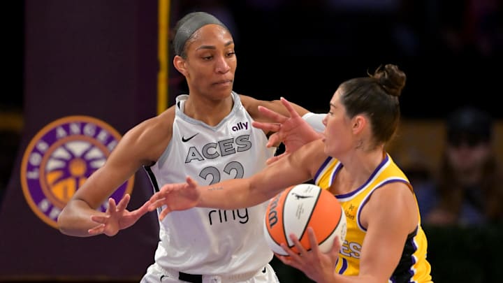 Sep 11, 2025; Los Angeles, California, USA; Las Vegas Aces center A'ja Wilson (22) guards Los Angeles Sparks guard Kelsey Plum (10) in the first half at Crypto.com Arena. Mandatory Credit: Jayne Kamin-Oncea-Imagn Images