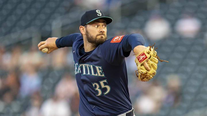 Jun 23, 2025; Minneapolis, Minnesota, USA; Seattle Mariners relief pitcher Zach Pop (35) delivers a pitch against the Minnesota Twins in the eighth inning at Target Field. Mandatory Credit: Jesse Johnson-Imagn Images Jun 23, 2025; Minneapolis, Minnesota, USA; Seattle Mariners relief pitcher Zach Pop (35) delivers a pitch against the Minnesota Twins in the eighth inning at Target Field. Mandatory Credit: Jesse Johnson-Imagn Images