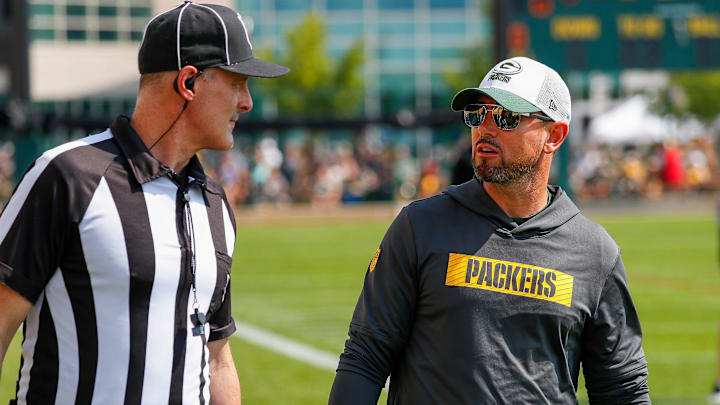 Green Bay Packers head coach Matt LaFleur chats with a referee before practice on Saturday, July 27, 2024, at Ray Nitschke Field in Ashwaubenon, Wis.
Tork Mason/USA TODAY NETWORK-Wisconsin