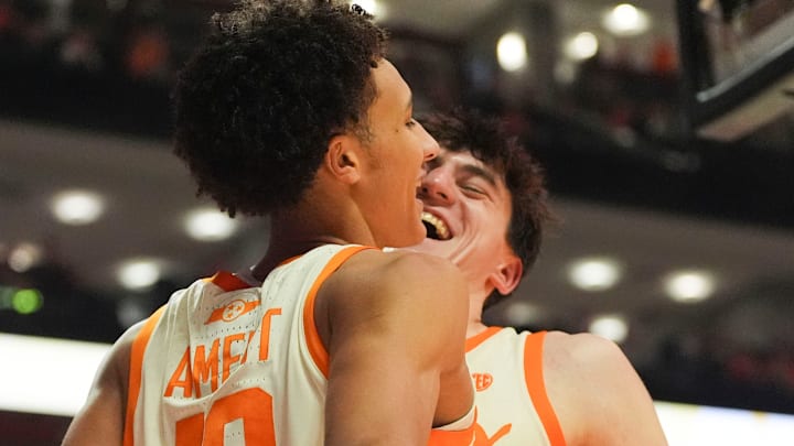 Tennessee forwards Nate Ament (10) and J.P. Estrella (13) celebrate after Ament drew a foul and scored during an NCAA college basketball game against Ole Miss on February 3, 2026.