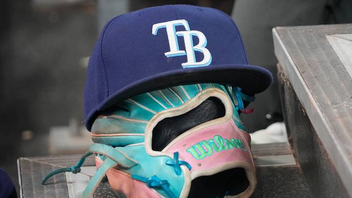 Sep 26, 2025; Toronto, Ontario, CAN; The hat and glove of Tampa Bay Rays third baseman Junior Caminero (13) in the dugout during the game against the Toronto Blue Jays at Rogers Centre. Mandatory Credit: John E. Sokolowski-Imagn Images Sep 26, 2025; Toronto, Ontario, CAN; The hat and glove of Tampa Bay Rays third baseman Junior Caminero (13) in the dugout during the game against the Toronto Blue Jays at Rogers Centre. Mandatory Credit: John E. Sokolowski-Imagn Images