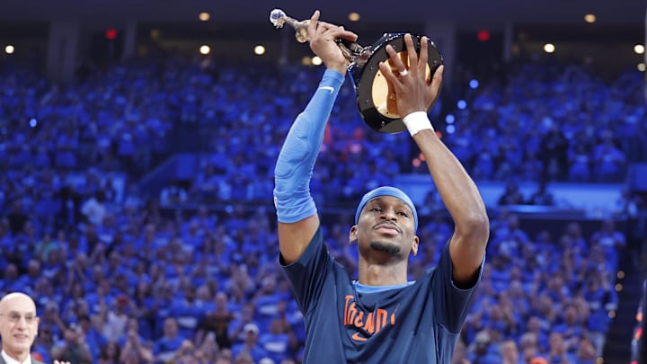 May 22, 2025; Oklahoma City, Oklahoma, USA; Oklahoma City Thunder guard Shai Gilgeous-Alexander holds up the Michael Jordan Trophy as the NBA's 2024-25 Most Valuable Player before Game 2 of the Western Conference Finals at Paycom Center. Mandatory Credit: Alonzo Adams-Imagn Images May 22, 2025; Oklahoma City, Oklahoma, USA; Oklahoma City Thunder guard Shai Gilgeous-Alexander holds up the Michael Jordan Trophy as the NBA's 2024-25 Most Valuable Player before Game 2 of the Western Conference Finals at Paycom Center. Mandatory Credit: Alonzo Adams-Imagn Images