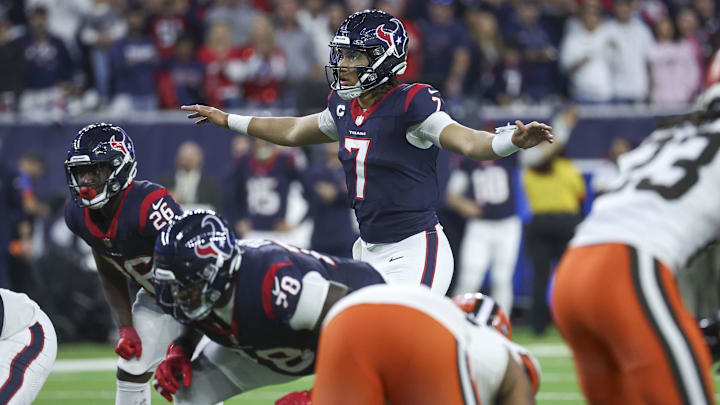 Jan 13, 2024; Houston, Texas, USA; Houston Texans quarterback C.J. Stroud (7) at the line of
