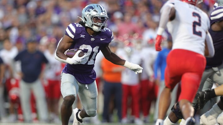Kansas State Wildcats running back DJ Giddens (31) runs the ball during the first quarter of the game against Arizona at Bill Snyder Family Stadium Friday, September 13, 2024.