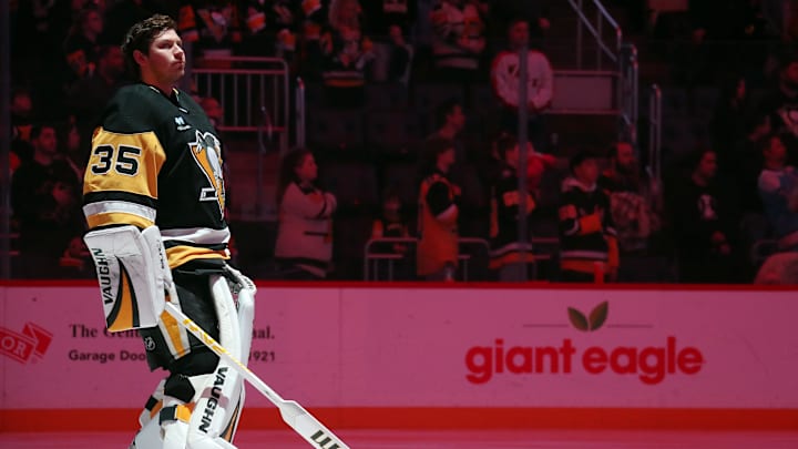 Jan 12, 2025; Pittsburgh, Pennsylvania, USA;  Pittsburgh Penguins goaltender Tristan Jarry (35) stands for the national anthem against the Tampa Bay Lightning at PPG Paints Arena. Mandatory Credit: Charles LeClaire-Imagn Images