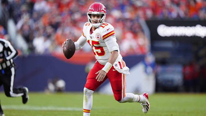 Nov 16, 2025; Denver, Colorado, USA; Kansas City Chiefs quarterback Patrick Mahomes (15) scrambles with the ball in the third quarter against the Denver Broncos at Empower Field at Mile High. Mandatory Credit: Ron Chenoy-Imagn Images Nov 16, 2025; Denver, Colorado, USA; Kansas City Chiefs quarterback Patrick Mahomes (15) scrambles with the ball in the third quarter against the Denver Broncos at Empower Field at Mile High. Mandatory Credit: Ron Chenoy-Imagn Images