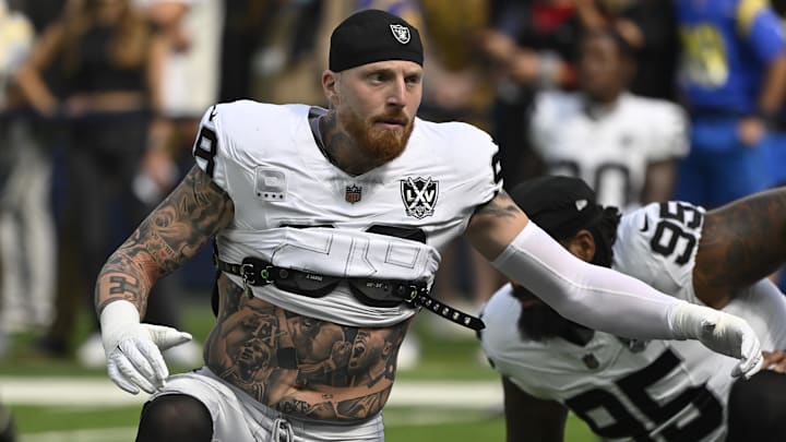 Oct 20, 2024; Inglewood, California, USA; Las Vegas Raiders defensive end Maxx Crosby (98) stretches during pregame warmups before an NFL game against the Los Angeles Rams at SoFi Stadium. Mandatory Credit: Robert Hanashiro-Imagn Images