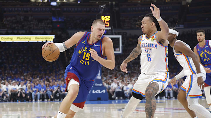 May 13, 2025; Oklahoma City, Oklahoma, USA; Denver Nuggets center Nikola Jokic (15) drives to the basket against Oklahoma City Thunder forward Jaylin Williams (6) during the second quarter of game five of the second round for the 2025 NBA Playoffs at Paycom Center. Mandatory Credit: Alonzo Adams-Imagn Images