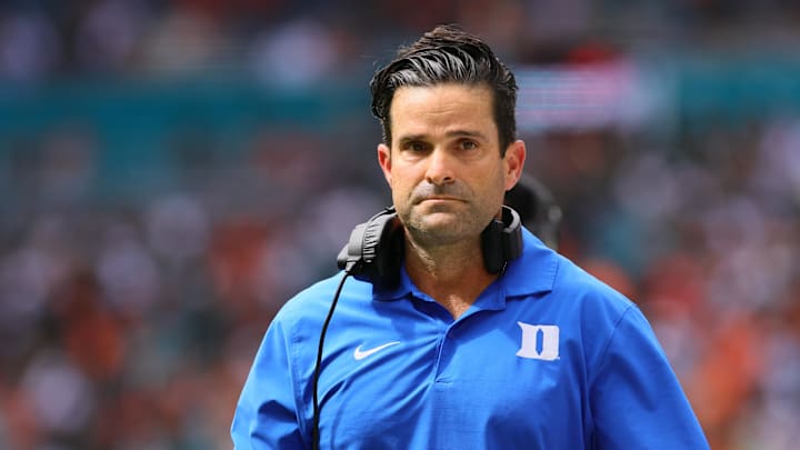 Nov 2, 2024; Miami Gardens, Florida, USA; Duke Blue Devils head coach Manny Diaz watches from the sideline against the Miami Hurricanes during the second quarter at Hard Rock Stadium. Mandatory Credit: Sam Navarro-Imagn Images Nov 2, 2024; Miami Gardens, Florida, USA; Duke Blue Devils head coach Manny Diaz watches from the sideline against the Miami Hurricanes during the second quarter at Hard Rock Stadium. Mandatory Credit: Sam Navarro-Imagn Images
