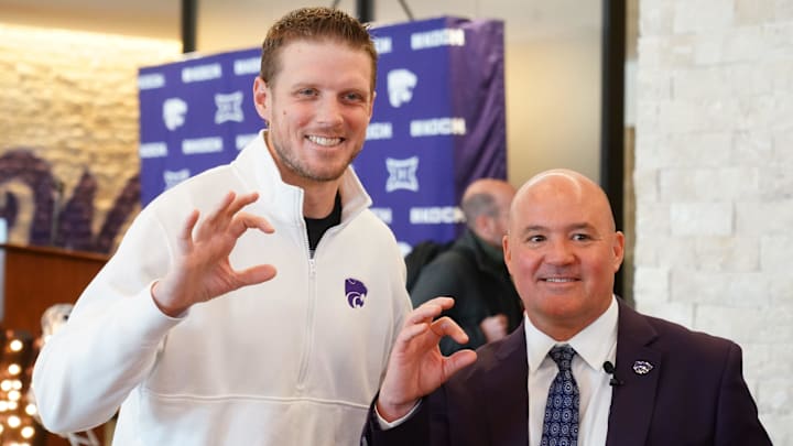 Casey Alexander, right, poses with football head coach Collin Klein, right, after being welcomed as the new head coach of the Kansas State men’s basketball team during a press conference at Bramlage Coliseum on Monday, March 16, 2026.