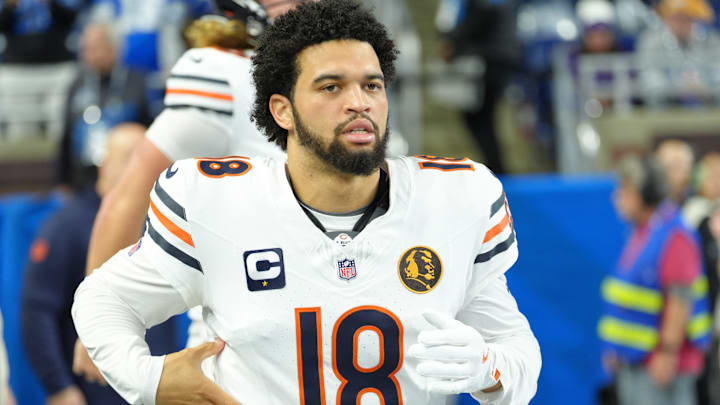 Chicago Bears quarterback Caleb Williams (18) runs onto the field to warm up on Thanksgiving Day at Ford Field in Detroit on Thursday, Nov. 28, 2024.