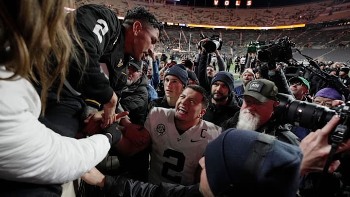 Vanderbilt quarterback Diego Pavia (2) celebrates with family and friends after defeating Tennessee at Neyland Stadium in Knoxville, Tenn., Saturday, Nov. 29, 2025. Vanderbilt quarterback Diego Pavia (2) celebrates with family and friends after defeating Tennessee at Neyland Stadium in Knoxville, Tenn., Saturday, Nov. 29, 2025.
