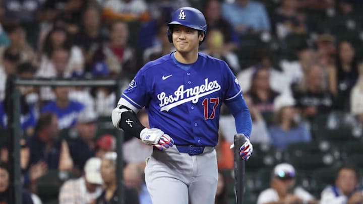 May 4, 2026; Houston, Texas, USA; Los Angeles Dodgers designated hitter Shohei Ohtani (17) smiles towards the Houston Astros dugout before batting during the first inning at Daikin Park. Mandatory Credit: Troy Taormina-Imagn Images