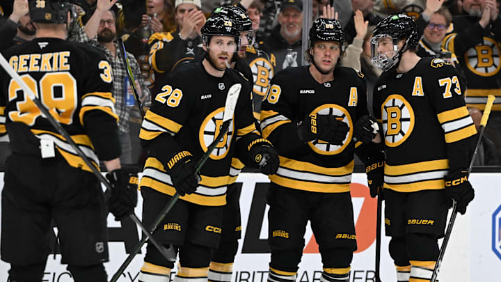 Dec 21, 2025; Boston, Massachusetts, USA; Boston Bruins right wing David Pastrnak #88 celebrates with teammates after scoring a goal against the Ottawa Senators during the first period at the TD Garden. Mandatory Credit: Brian Fluharty-Imagn Images