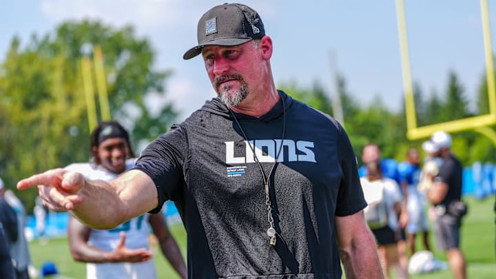 Detroit Lions head coach Dan Campbell talks to staff at the end of the joint practice with the Miami Dolphins at the Lions headquarters and training facility in Allen Park, Thursday, Aug. 14 2025