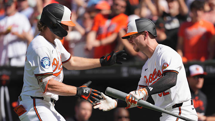Sep 2, 2024; Baltimore, Maryland, USA; Baltimore Orioles shortstop Gunnar Henderson (left) celebrates his first inning solo home run with first baseman Ryan OíHearn (right) against the Chicago White Sox at Oriole Park at Camden Yards