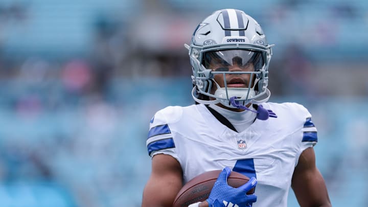 Dallas Cowboys wide receiver Jalen Tolbert warms up before the game against the Carolina Panthers at Bank of America Stadium.
