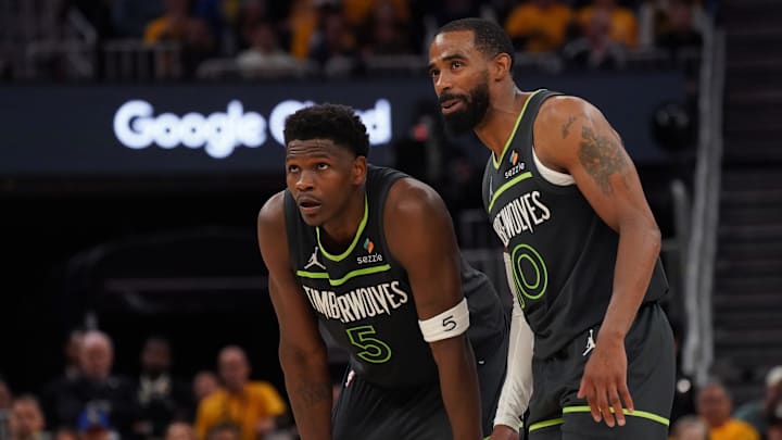 May 10, 2025; San Francisco, California, USA; Minnesota Timberwolves guard Anthony Edwards (5) and guard Mike Conley (10) wait for play to resume against the Golden State Warriors in the fourth quarter during game three in the second round for the 2025 NBA Playoffs at Chase Center. Mandatory Credit: David Gonzales-Imagn Images