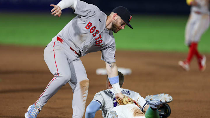 Sep 20, 2025; Tampa, Florida, USA; Boston Red Sox shortstop Trevor Story (10) catches Tampa Bay Rays left fielder Jake Mangum (28) in a run down in the eighth inning at George M. Steinbrenner Field. Mandatory Credit: Nathan Ray Seebeck-Imagn Images Sep 20, 2025; Tampa, Florida, USA; Boston Red Sox shortstop Trevor Story (10) catches Tampa Bay Rays left fielder Jake Mangum (28) in a run down in the eighth inning at George M. Steinbrenner Field. Mandatory Credit: Nathan Ray Seebeck-Imagn Images