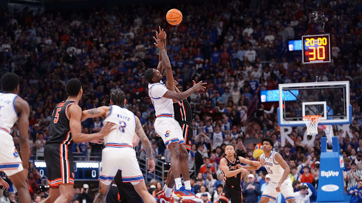 Houston is favored against Kansas in the Big 12 semifinal.