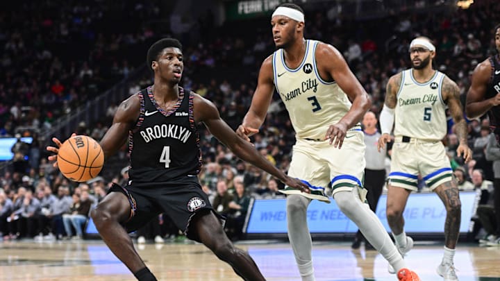 Nov 29, 2025; Milwaukee, Wisconsin, USA; Brooklyn Nets guard Drake Powell (4) looks for a shot against Milwaukee Bucks center Myles Turner (3) in the third quarter at Fiserv Forum. Mandatory Credit: Benny Sieu-Imagn Images Nov 29, 2025; Milwaukee, Wisconsin, USA; Brooklyn Nets guard Drake Powell (4) looks for a shot against Milwaukee Bucks center Myles Turner (3) in the third quarter at Fiserv Forum. Mandatory Credit: Benny Sieu-Imagn Images