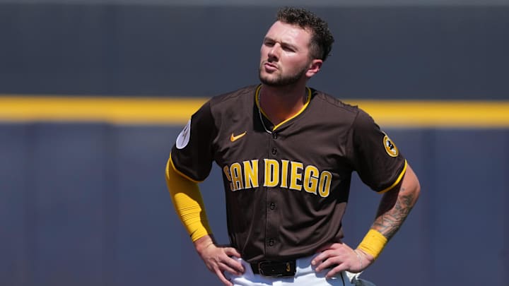 Mar 22, 2025; Peoria, Arizona, USA; San Diego Padres outfielder Jackson Merrill (3) reacts after getting out against the Cincinnati Reds in the first inning at Peoria Sports Complex. Mandatory Credit: Rick Scuteri-Imagn Images