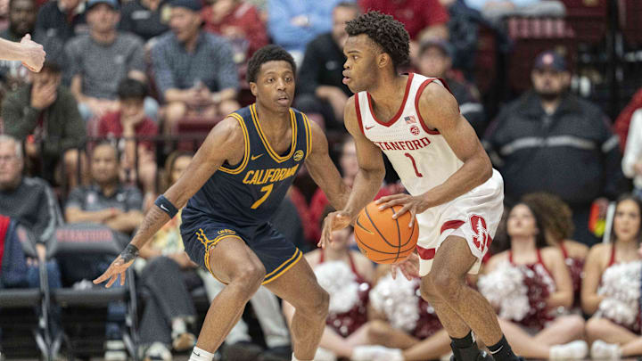 Jan 24, 2026; Stanford, California, USA;  Stanford Cardinal guard Ebuka Okorie (1) controls the ball during the second half against California Golden Bears guard Dai Dai Ames (7) at Maples Pavilion. Mandatory Credit: Stan Szeto-Imagn Images