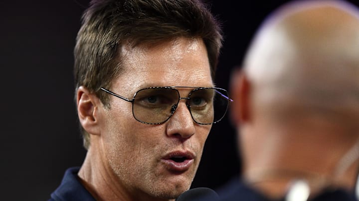 Aug 8, 2025; Foxborough, Massachusetts, USA; Retired Hall of Fame New England Patriot player Tom Brady talks with Brian Hoyer 