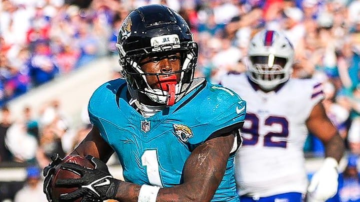 Jacksonville Jaguars running back Travis Etienne Jr. (1) runs towards the end zone during the fourth quarter in an NFL football AFC Wild Card playoff matchup, Sunday, Jan. 11, 2026, in Jacksonville, Fla. Bills lead 10-7 at the half over the Jaguars. The Bills defeated the Jaguars 27-24. Jacksonville Jaguars running back Travis Etienne Jr. (1) runs towards the end zone during the fourth quarter in an NFL football AFC Wild Card playoff matchup, Sunday, Jan. 11, 2026, in Jacksonville, Fla. Bills lead 10-7 at the half over the Jaguars. The Bills defeated the Jaguars 27-24.
