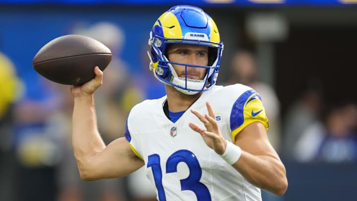 Aug 9, 2025; Inglewood, California, USA; Los Angeles Rams quarterback Stetson Bennett IV (13) throws the ball against the Dallas Cowboys in the first half at SoFi Stadium. Mandatory Credit: Kirby Lee-Imagn Images
