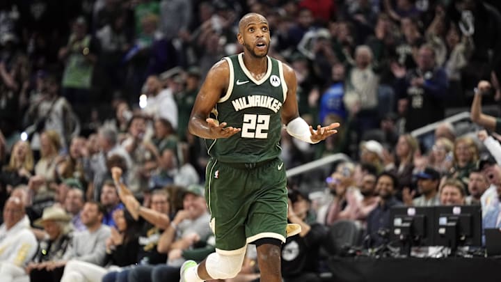 Apr 30, 2024; Milwaukee, Wisconsin, USA;  Milwaukee Bucks forward Khris Middleton (22) reacts after scoring a basket during the fourth quarter against the Indiana Pacers during game five of the first round for the 2024 NBA playoffs at Fiserv Forum. Mandatory Credit: Jeff Hanisch-Imagn Images