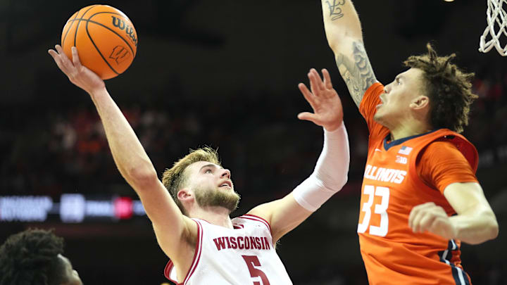 Mar 2, 2024; Madison, Wisconsin, USA; Wisconsin Badgers forward Tyler Wahl (5) scores against Illinois.