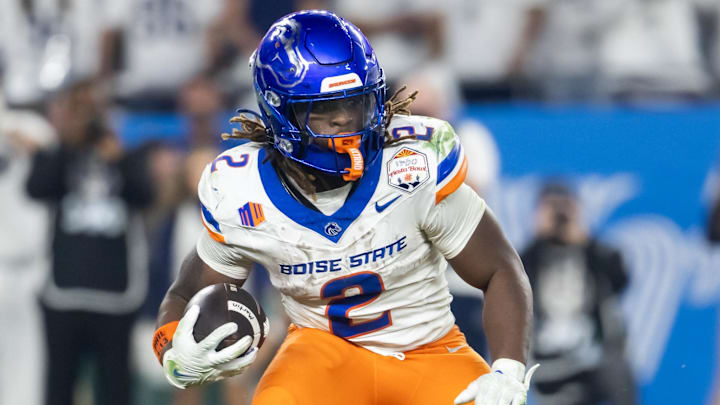 Dec 31, 2024; Glendale, AZ, USA; Boise State Broncos running back Ashton Jeanty (2) against the Penn State Nittany Lions during the Fiesta Bowl at State Farm Stadium. Mandatory Credit: Mark J. Rebilas-Imagn Images