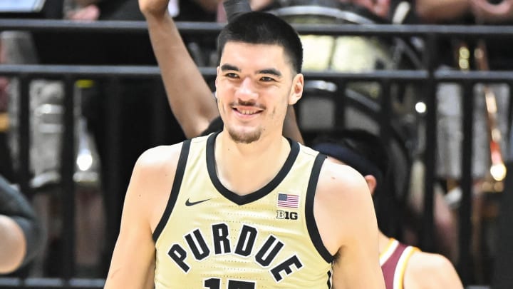 Purdue center Zach Edey celebrates after a play against Minnesota 