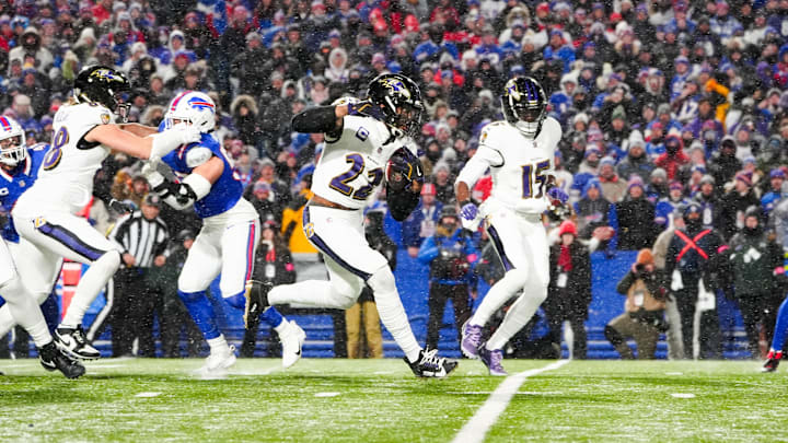 Jan 19, 2025; Orchard Park, New York, USA; Baltimore Ravens running back Derrick Henry (22) runs the ball during the first quarter against the Buffalo Bills in a 2025 AFC divisional round game at Highmark Stadium. Mandatory Credit: Gregory Fisher-Imagn Images Jan 19, 2025; Orchard Park, New York, USA; Baltimore Ravens running back Derrick Henry (22) runs the ball during the first quarter against the Buffalo Bills in a 2025 AFC divisional round game at Highmark Stadium. Mandatory Credit: Gregory Fisher-Imagn Images