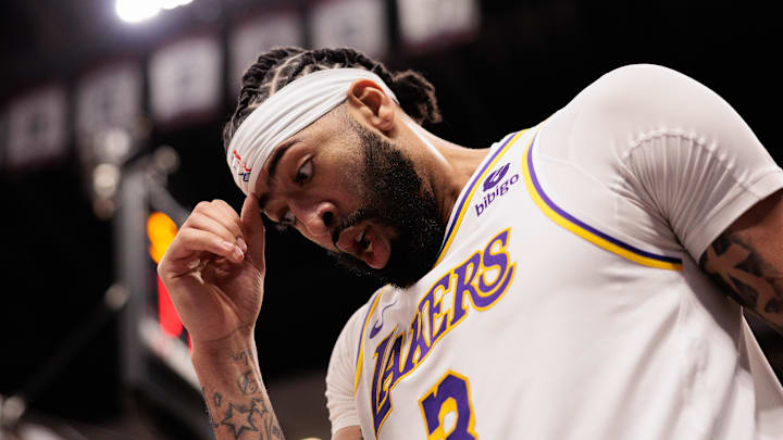 Apr 20, 2024; Denver, Colorado, USA; Los Angeles Lakers forward Anthony Davis (3) reacts to a foul during the fourth quarter against the Denver Nuggets in game one of the first round for the 2024 NBA playoffs at Ball Arena. Apr 20, 2024; Denver, Colorado, USA; Los Angeles Lakers forward Anthony Davis (3) reacts to a foul during the fourth quarter against the Denver Nuggets in game one of the first round for the 2024 NBA playoffs at Ball Arena.