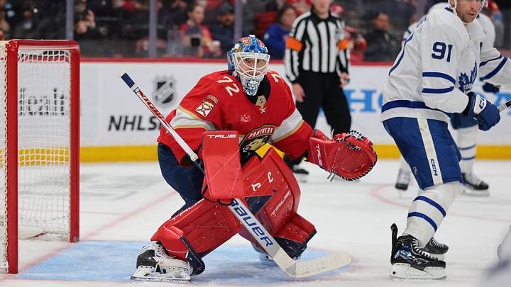 Feb 26, 2026; Sunrise, Florida, USA; Florida Panthers goaltender Sergei Bobrovsky (72) defends his net from Toronto Maple Leafs center John Tavares (91) during the second period at Amerant Bank Arena. Mandatory Credit: Sam Navarro-Imagn Images