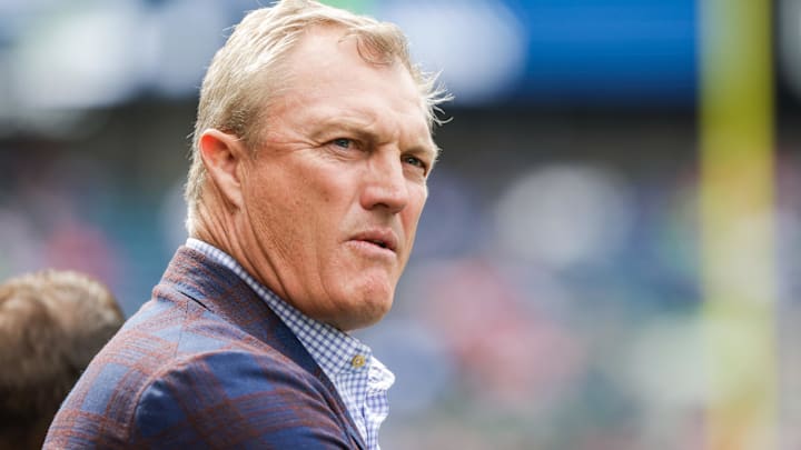  San Francisco 49ers general manager John Lynch watches pregame warmups against the Seattle Seahawks at Lumen Field.