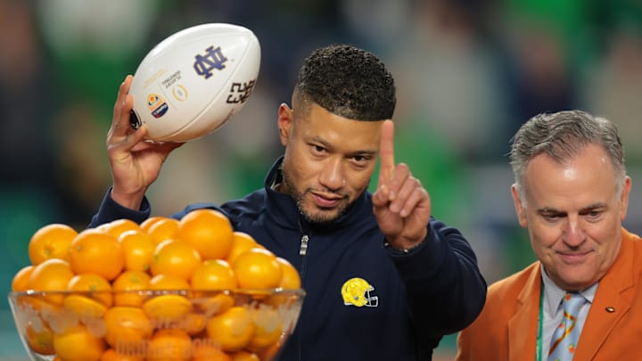 Jan 9, 2025; Miami, FL, USA; Notre Dame Fighting Irish head coach Marcus Freeman celebrates defeating the Penn State Nittany Lions  in the Orange Bowl at Hard Rock Stadium. Mandatory Credit: Sam Navarro-Imagn Images