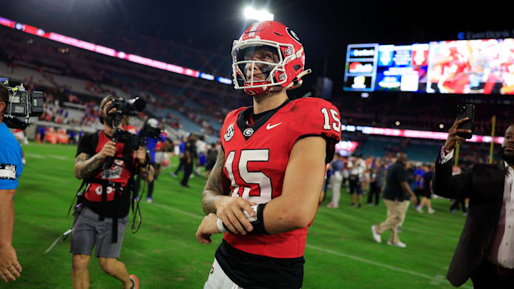 Georgia Bulldogs quarterback Carson Beck (15) walks off the field after the game of an NCAA college football matchup Saturday, Nov. 2, 2024 at EverBank Stadium in Jacksonville, Fla. The Georgia Bulldogs defeated the Florida Gators 34-20.