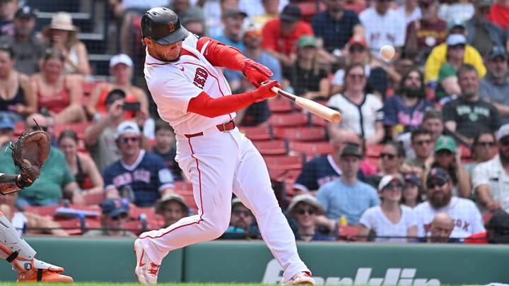 Jun 4, 2026; Boston, Massachusetts, USA; Boston Red Sox first baseman Willson Contreras (40) hits a one run home run against the Baltimore Orioles during the ninth inning at Fenway Park. Mandatory Credit: Eric Canha-Imagn Images