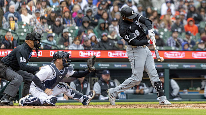 Apr 5, 2025; Detroit, Michigan, USA; Chicago White Sox outfielder Luis Robert Jr. (88) picks up an RBI on a fielders choice double play in the fifth inning against the Detroit Tigers at Comerica Park. Mandatory Credit: David Reginek-Imagn Images