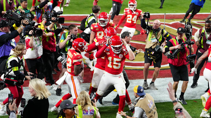 Feb 11, 2024; Paradise, Nevada, USA; Kansas City Chiefs quarterback Patrick Mahomes (15) celebrates after throwing the winning touchdown to wide receiver Mecole Hardman Jr. (12) during overtime against the San Francisco 49ers in Super Bowl LVIII at Allegiant Stadium. Mandatory Credit: Stephen R. Sylvanie-Imagn Images Feb 11, 2024; Paradise, Nevada, USA; Kansas City Chiefs quarterback Patrick Mahomes (15) celebrates after throwing the winning touchdown to wide receiver Mecole Hardman Jr. (12) during overtime against the San Francisco 49ers in Super Bowl LVIII at Allegiant Stadium. Mandatory Credit: Stephen R. Sylvanie-Imagn Images