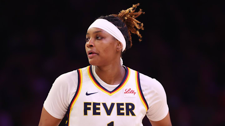 Jun 30, 2024; Phoenix, Arizona, USA; Indiana Fever forward NaLyssa Smith (1) against the Phoenix Mercury during a WNBA game at Footprint Center. Mandatory Credit: Mark J. Rebilas-Imagn Images