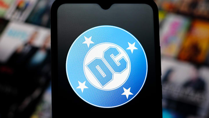 In this photo illustration, the DC Comics logo is seen...