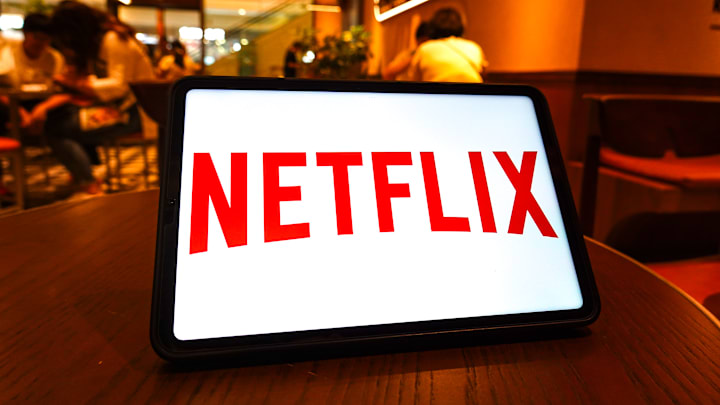 In this photo illustration, the Netflix logo is seen...