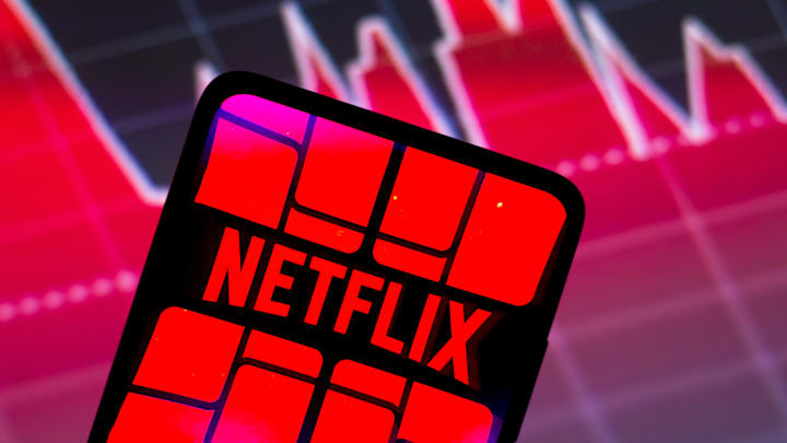 In this photo illustration the Netflix logo seen displayed...