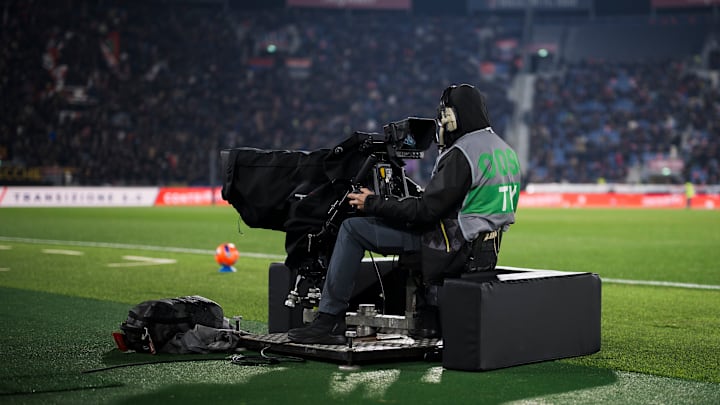 A cameraman works with a TV camera prior to the Serie A
