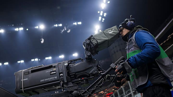 A cameraman works with a TV camera during the Serie A