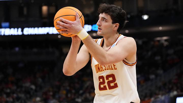 Mar 23, 2025; Milwaukee, WI, USA; Iowa State Cyclones forward Milan Momcilovic (22) shoots against the Mississippi Rebels during the second half in the second round of the NCAA Tournament at Fiserv Forum. Mandatory Credit: Jeff Hanisch-Imagn Images Mar 23, 2025; Milwaukee, WI, USA; Iowa State Cyclones forward Milan Momcilovic (22) shoots against the Mississippi Rebels during the second half in the second round of the NCAA Tournament at Fiserv Forum. Mandatory Credit: Jeff Hanisch-Imagn Images